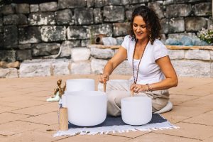 Beth Lewis guiding a breathwork session for holistic healing